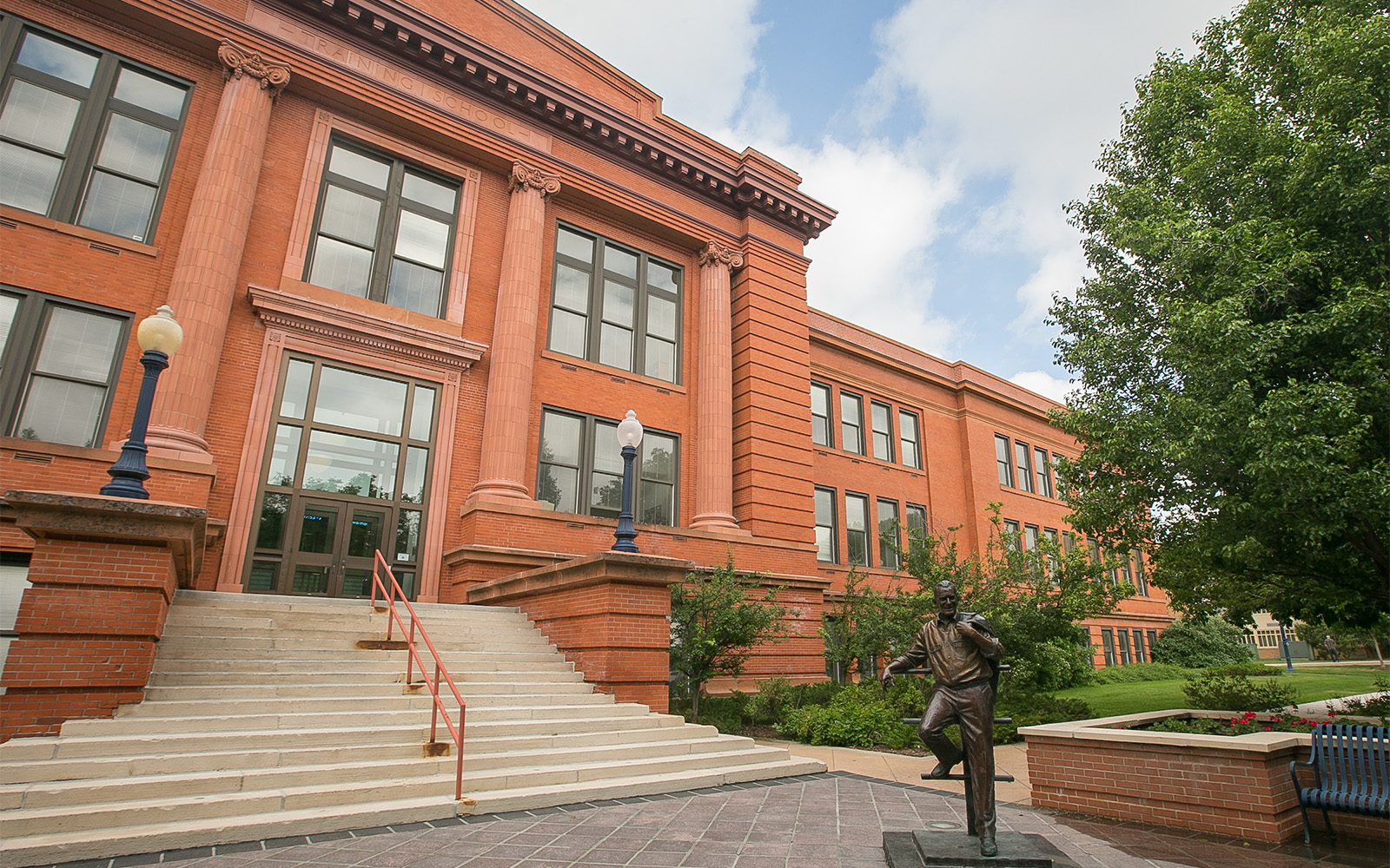 Outside of Kepner Hall featuring a statue of Kenneth Monfort